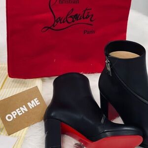 Christian Louboutin Black Heeled Boots with Red Soles